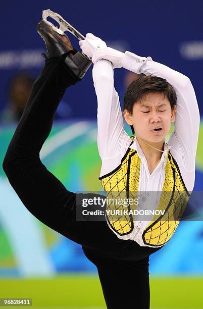 Kazakh's Denis Ten competes in his Figure Skating men's short program at the Pacific Coliseum in Vancouver during the 2010 Winter Olympics on...