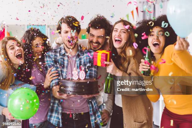friends celebrating birthday party in the office - 30th birthday stock pictures, royalty-free photos & images