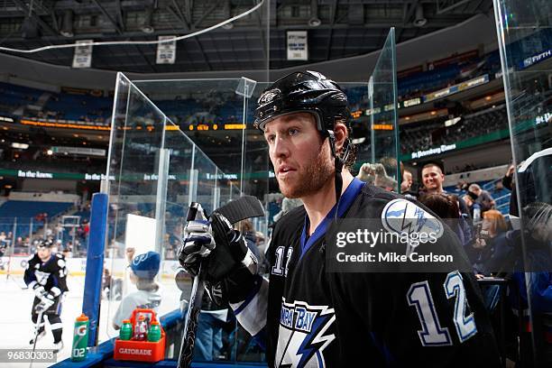 Ryan Malone of the Tampa Bay Lightning walks out to the ice for pre-game skate against the Boston Bruins at the St. Pete Times Forum on February 11,...