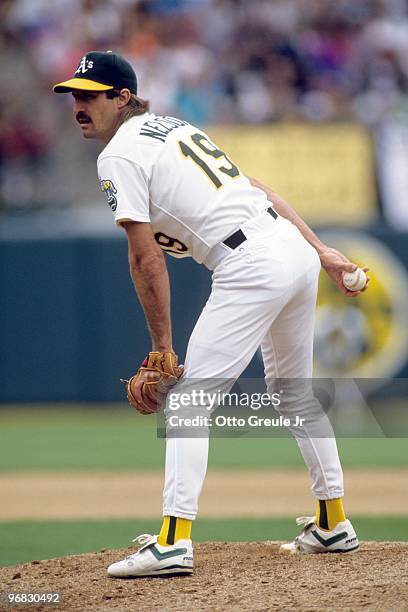 Gene Nelson of the Oakland Athletics pitches during a game against the Baltimore Orioles at Oakland-Alameda County Coliseum on July 14, 1991 in...