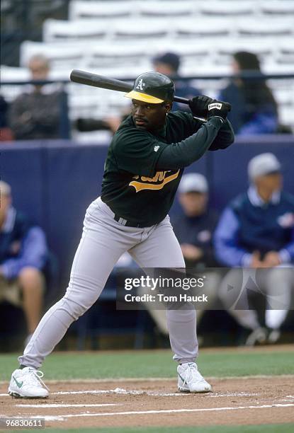 Tim Raines of the Oakland Athletics gets ready at bat during the spring training day game against the Anaheim Angels at Tempe Diablo Stadium on March...