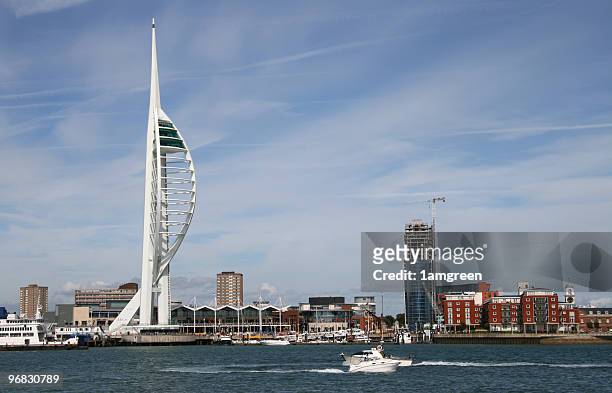 spinnaker tower and gunwharf quays in portsmouth harbour - portsmouth stock pictures, royalty-free photos & images