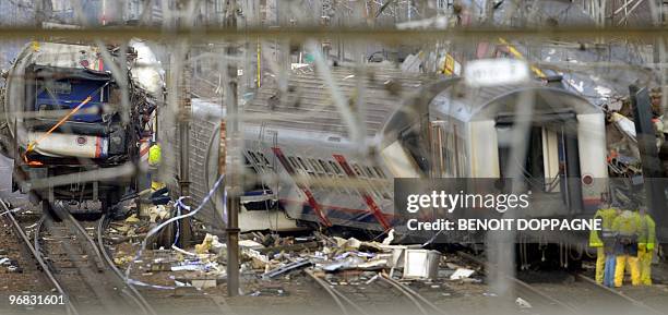 Partial view of the twisted debris from the wreckages of the two trains that collided last Monday near Buizingen train station, in Halle on February...