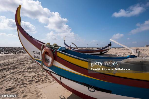 Fishing boats seen on the beach in a Sunday afternoon on May 27, 2018 in Espinho, Portugal. Fishermen do not go out to sea on Sundays and some of...