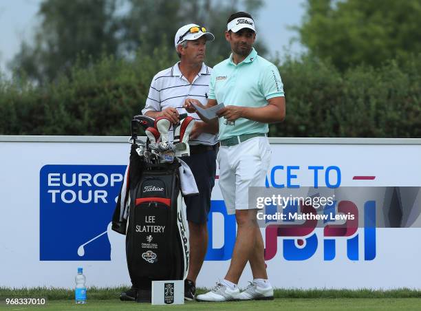 Lee Slattery of England looks on with his caddie during the Pro-Am of The 2018 Shot Clock Masters at Diamond Country Club on June 6, 2018 in...