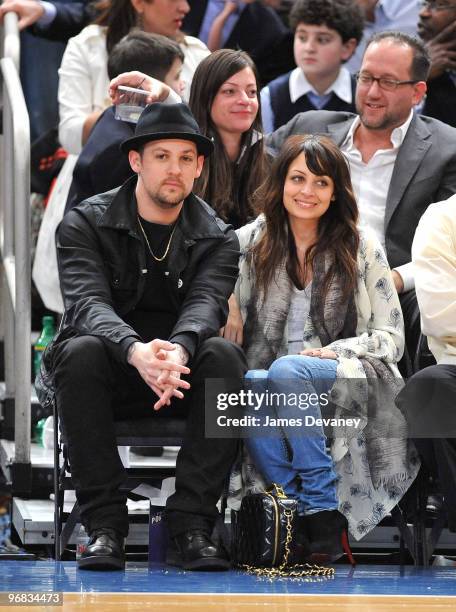 Joel Madden and Nicole Richie attend the Chicago Bulls vs New York Knicks game at Madison Square Garden on February 17, 2010 in New York City.