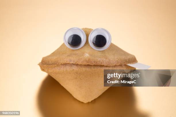 fortune cookies with cartoon eyes - google eyes stock pictures, royalty-free photos & images