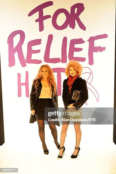 Kimberley Walsh and Nicola Roberts from Girls Aloud backstage during Naomi Campbell's Fashion For Relief Haiti London 2010 Fashion Show at Somerset...