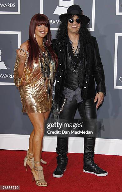 Perla Hudson and Slash arrive at the 52nd Annual GRAMMY Awards held at Staples Center on January 31, 2010 in Los Angeles, California.