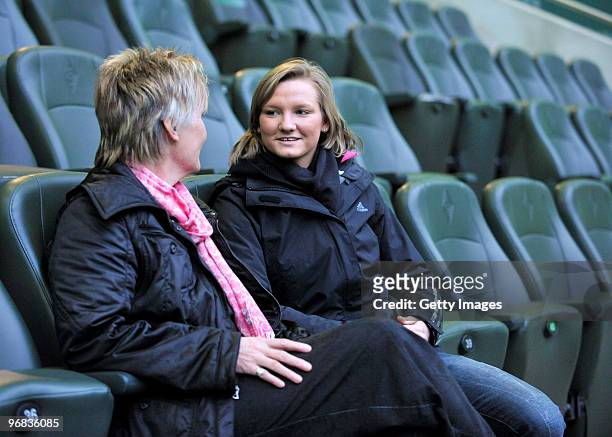 Tina Theune and Alexandra Popp talking to each other prior the FIFA Women's World Cup 2011 Countdown event at the Borussia Park Arena on February 18,...