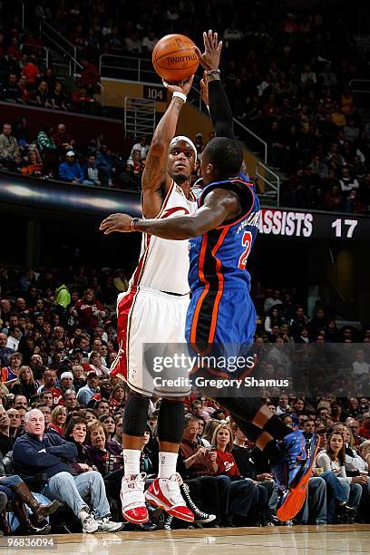 Daniel Gibson of the Cleveland Cavaliers shoots against Nate Robinson of the New York Knicks during the game on February 6, 2010 at Quicken Loans...