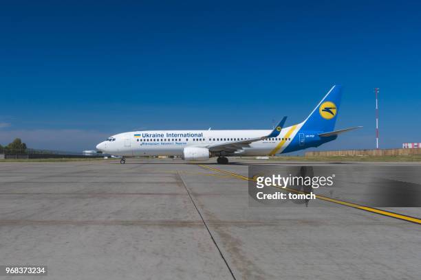 aircraft of ukraine international airlines at boryspil international airport, ukraine - ukraine international airlines stock pictures, royalty-free photos & images