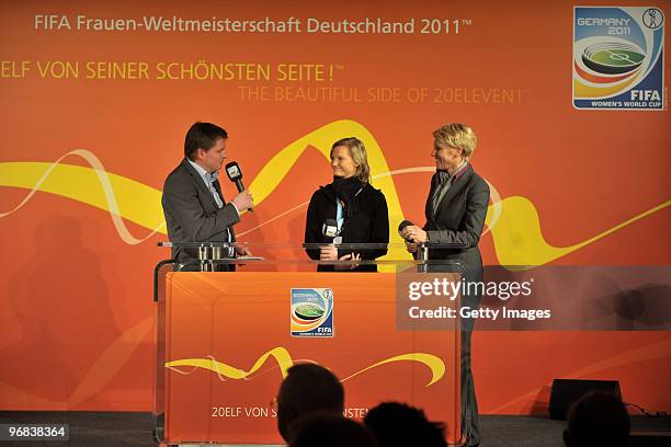 Host Jens Grittner, Alexandra Popp, and manager of the German women's national team Doris Fritschen talking during the FIFA Women's World Cup 2011...