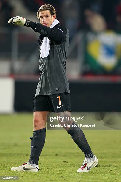 Tim Wiese of Bremen looks dejected after losing 0-1 the UEFA Europa League knock-out round, first leg match between FC Twente Enschede and SV Werder...