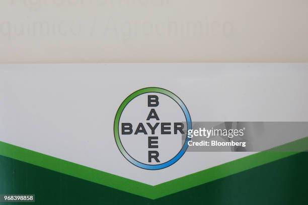 The Bayer AG logo sits on a Bayer Cropscience AG crop protection product at a farm in Abbenes, Netherlands, on Wednesday, June 6, 2018. After waiting...