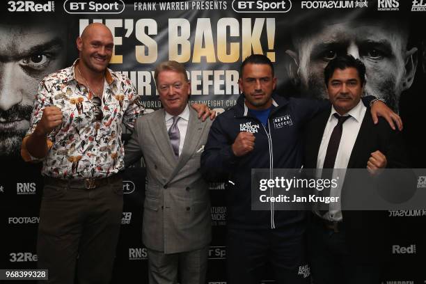 Tyson Fury and Sefer Seferi pose with Frank Warren and Erol Ceylan during the Tyson Fury and Sefer Seferi Press Conference on June 6, 2018 in...