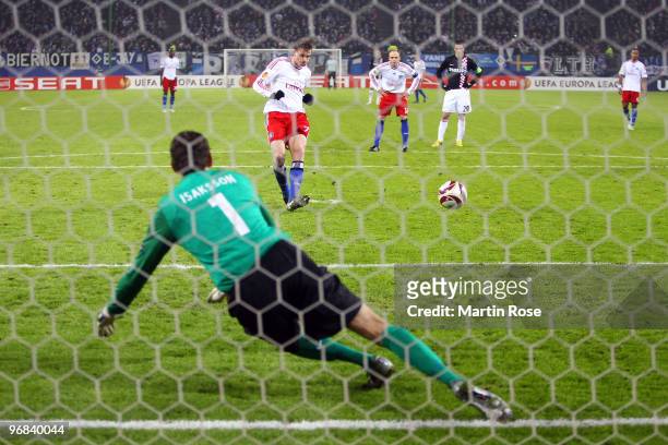 Marcell Jansen of Hamburg scores his team's first goal during the UEFA Europa League knock-out round, first leg match between Hamburger SV and PSV...