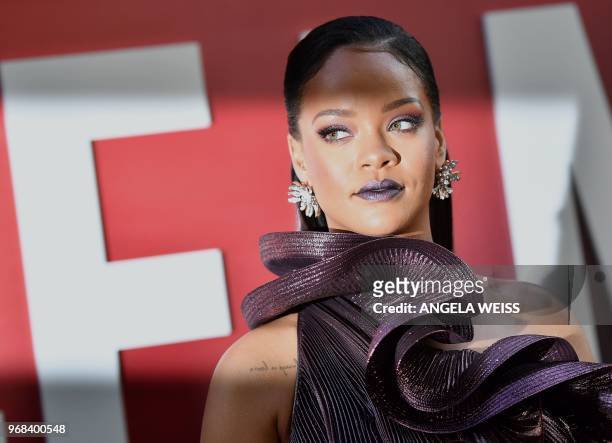 Barbadian singer/actress Rihanna arrives for the world premiere of Ocean's 8 on June 5, 2018 in New York. - Ocean's 8 will be released nationwide on...