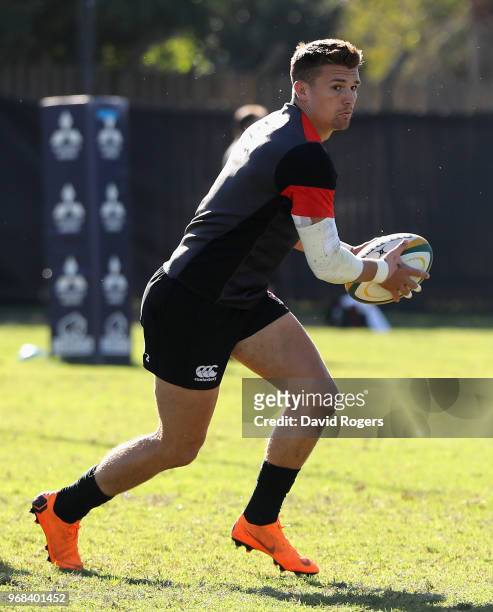 Henry Slade runs with the ball during the England training session at Kings Park Stadium on June 6, 2018 in Durban, South Africa.
