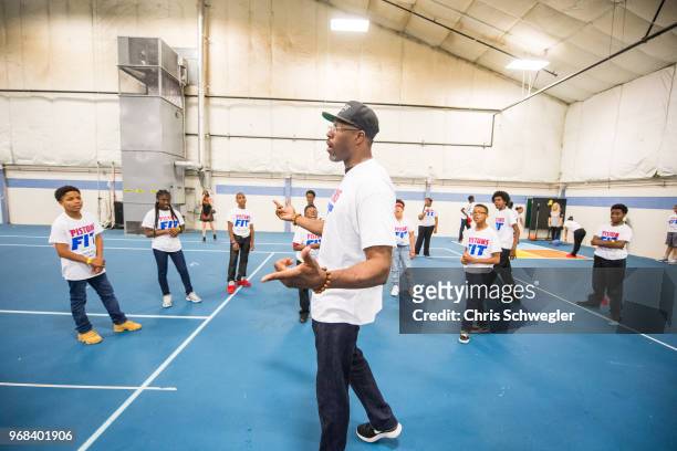 Detroit Pistons legend Ben Wallace lead students in fitness activities and celebrate the schools victory in a ten-week competition for highest...