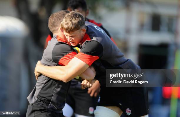 Jonny Hill tackles Mark Wilson during the England training session at Kings Park Stadium on June 6, 2018 in Durban, South Africa.