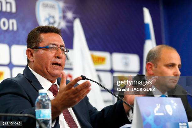 Ofer Eini , President of the Israeli Football Association , and Rotem Kamer, CEO of the Israeli football Association, take part in a press conference...