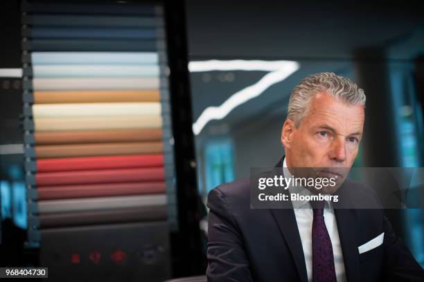 Torsten Muller-Otvos, chief executive officer of Rolls-Royce Motor Cars Ltd., listens during an interview in Vancouver, British Columbia, Canada, on...