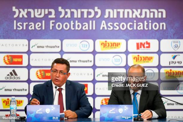 Ofer Eini, President of the Israeli Football Association , and Rotem Kamer , CEO of the Israeli football Association, take part in a press conference...