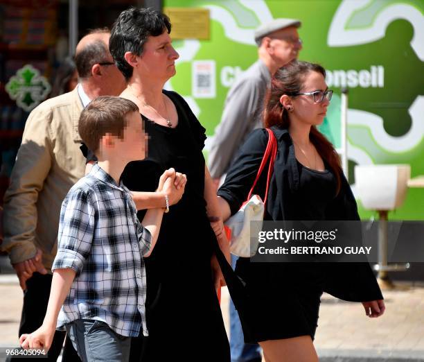 Mother of murdered French au-pair Sophie Lionnet, Catherine Devallonne walks accompanied by her son Romaric and her daughter Elodie during the...