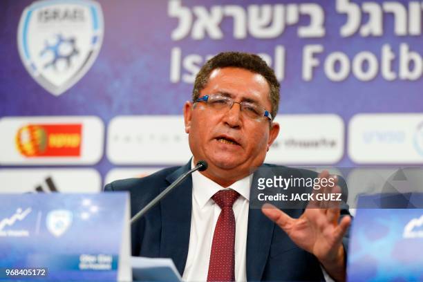 Ofer Eini, President of the Israeli Football Association , and Rotem Kamer , CEO of the Israeli football Association, take part in a press conference...