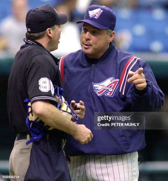 Anaheim Angels' manager Mike Scioscia disputes a call 19 July 2001, by Ron Barnes in the fifth inning at the Tropicana Field in St. Petersburg,...