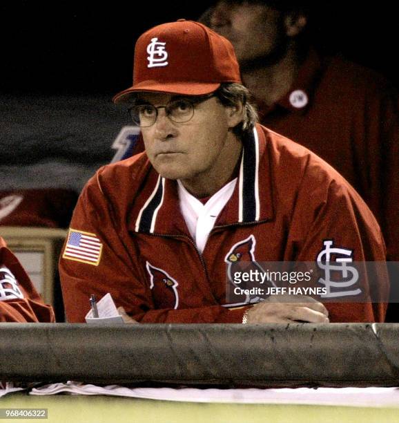 Manager Tony La Russa of the St. Louis Cardinals watches the final out by the San Francisco Giants 10 October 2002, during game two of the National...