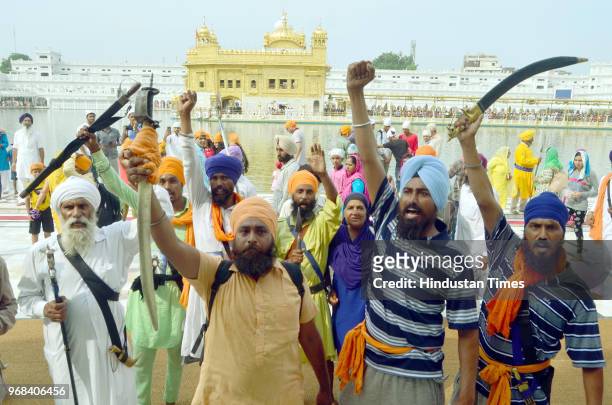 Sikh hardliners brandishing swords and raising pro-khalistan slogans on the anniversary of Operation Bluestar at Golden Temple complex on June 6 2018...