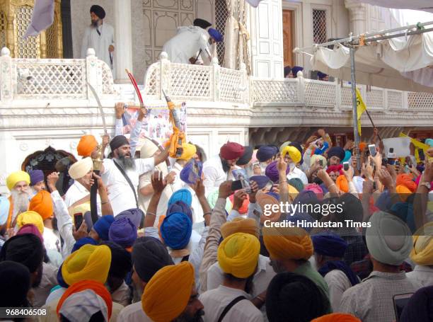 Sikh hardliners gathered around the Akal takht and raising pro-khalistan slogans on the anniversary of Operation Bluestar at Akal Takht Golden Temple...