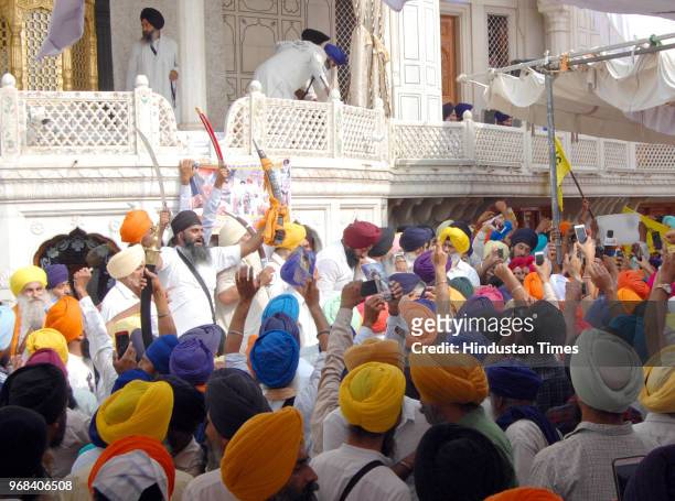 Sikh hardliners gathered around the Akal takht and raising pro-khalistan slogans on the anniversary of Operation Bluestar at Akal Takht Golden Temple...