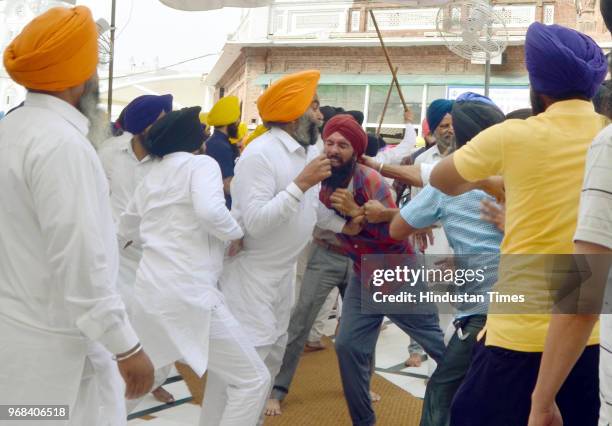 Scuffle between members of the SGPC task force and few youths on the occasion of Operation Bluestar Anniversary at Golden Temple on June 6 2018 in...