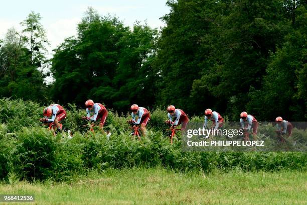 Riders of Switzerland's Katusha Alpecin cycling team compete during the third stage of the 70th edition of the Criterium du Dauphine cycling race, a...