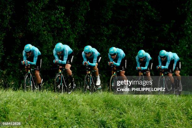 Riders of Kazakhstan's Astana Pro cycling team compete during the third stage of the 70th edition of the Criterium du Dauphine cycling race, a...