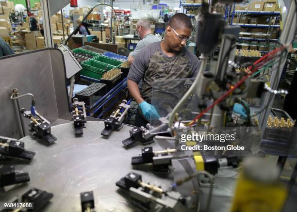 Jimmy Jeanbart works at Symmons Industries Inc. In Braintree, MA on May 24, 2018. Symmons and other local manufacturers are using technology - from...