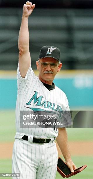 Florida Marlins manager Jim Leyland shows the fans his World Series ring during a ceremony held 05 April at Pro Player Stadium in Miami, FL. The...