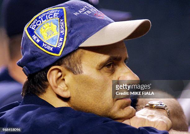 New York Yankees' manager Joe Torre watches his squad workout at Bank One Ballpark 25 October 2001 in Phoenix. This was the Yankees' first practice...