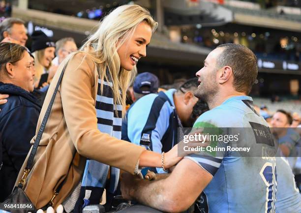 Boyd Cordner of the Blues celebrates with family and friends in the crowd after winning game one of the State Of Origin series between the Queensland...