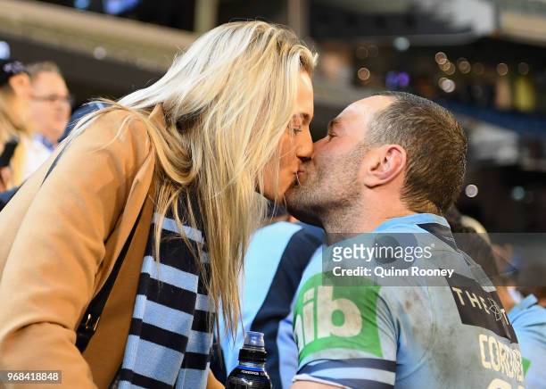 Boyd Cordner of the Blues celebrates with family and friends in the crowd after winning game one of the State Of Origin series between the Queensland...
