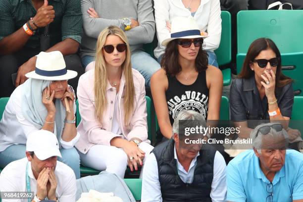 Rafael Nadal's mother Ana Maria Parera, sister, Maria Isabel Nadal and girlfriend, Xisca Perello watch on during his mens singles quarter finals...