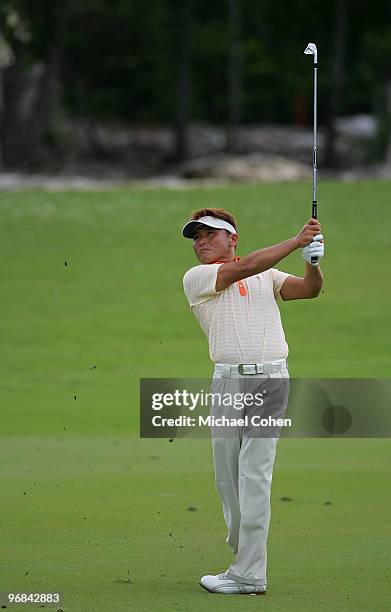 Shigeki Maruyama of Japan plays a shot during the first round of the Mayakoba Golf Classic at El Camaleon Golf Club held on February 18, 2010 in...