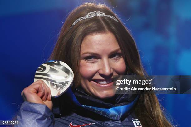 Julia Mancuso of the United States celebrates receiving her silver medal during the medal ceremony for the Alpine Skiing Ladies Downhill on day 6 of...