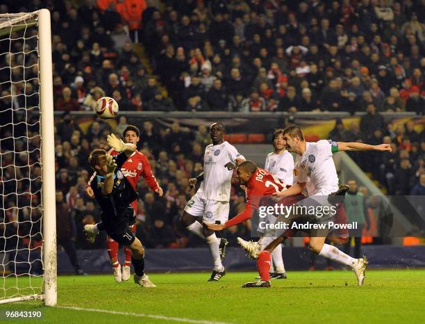 David Ngog of Liverpool scores a goal during the UEFA Europa League first leg game between Liverpool and Unirea Urziceni at Anfield on February 18,...