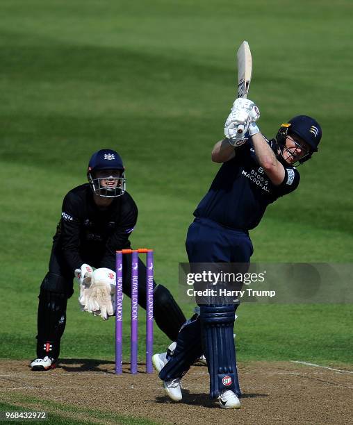 Eoin Morgan of Middlesex bats as Gareth Roderick of Gloucestershire looks on during the Royal London One-Day Cup match between Gloucestershire and...