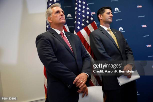 House Majority Leader Kevin McCarthy and House Speaker Paul Ryan look on during a news conference following a House Republican Conference meeting...
