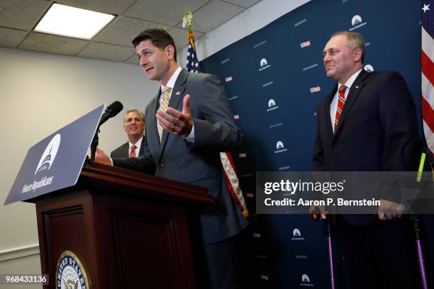 House Speaker Paul Ryan , accompanied by Reps. Steve Scalise and Kevin McCarthy talks with journalists during a news conference following a House...